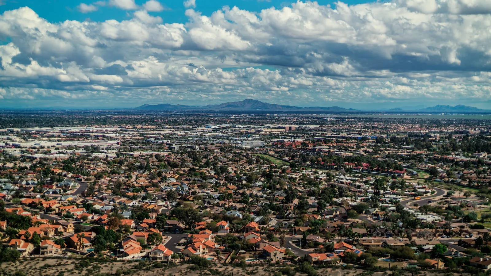 Aerial view of a growing East Valley neighborhood along the 202-to-Ironwood corridor — fit for recurring dog waste cleanup