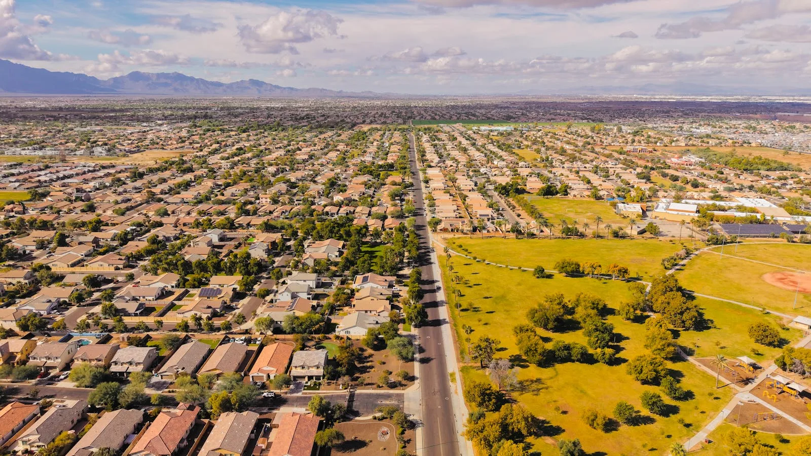 Gilbert Power Ranch–style home with stucco and tile roof — weekly pooper scooper service for Power Ranch residents
